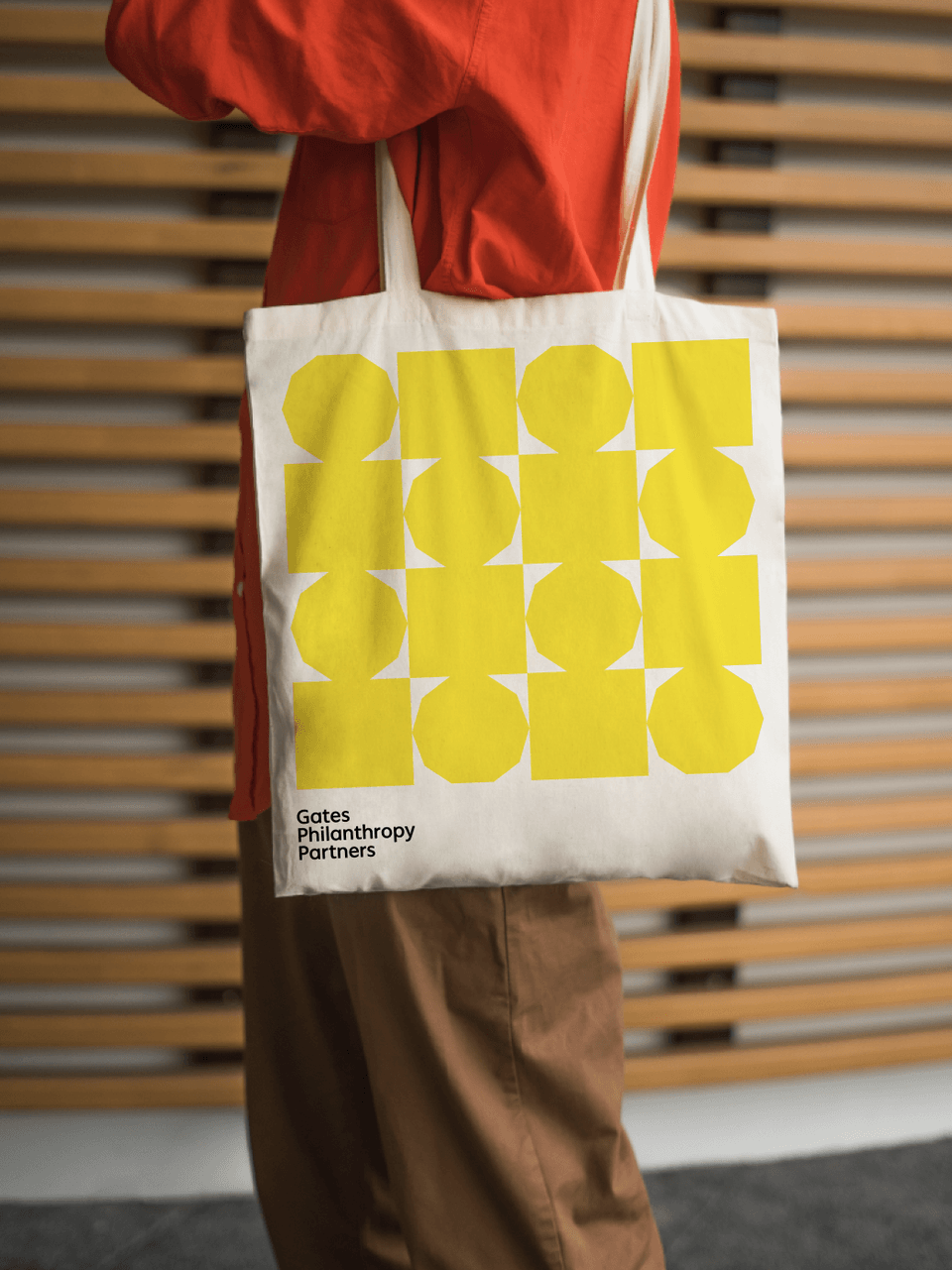 Tote bag with large yellow squares and decagons and GPP wordmark.