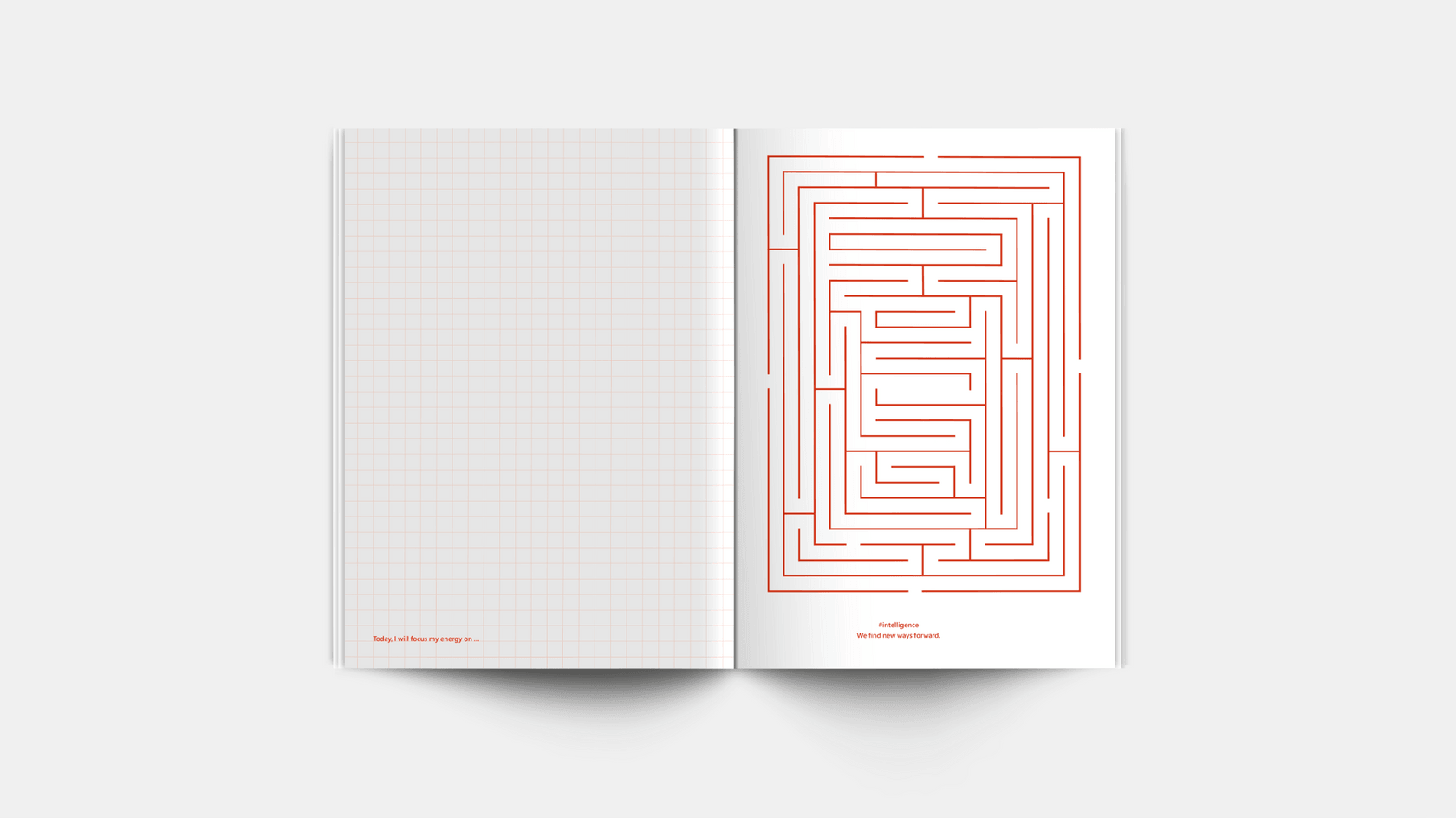 Pages of a square-ruled notebook with a maze drawn in orange.