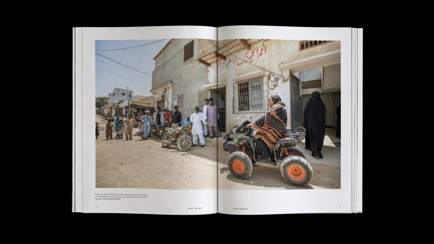 Open pages of printed booklet with data, photography, and headlines.