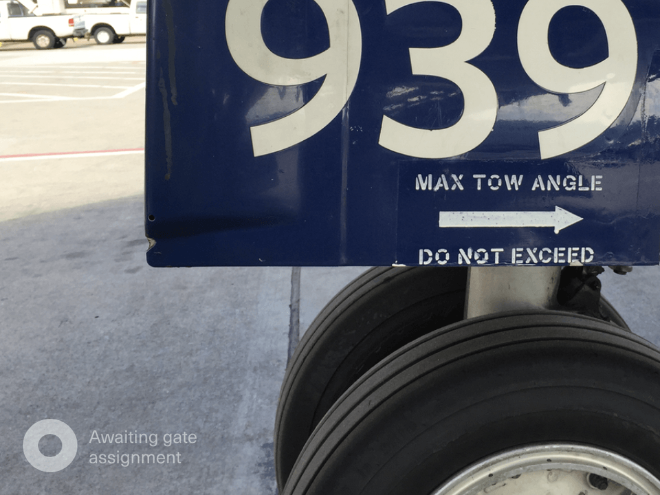 Close-up of a wheel on a Delta aircraft.